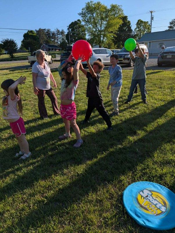 Kids playing with balloons